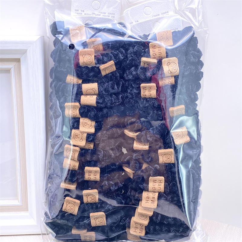 Traje de tarjeta cara sonriente oso etiqueta de cuero leche té color Banda para el cabello corbata de pelo de las mujeres banda de goma supermercado 2 yuanes tienda física accesorios para el cabello