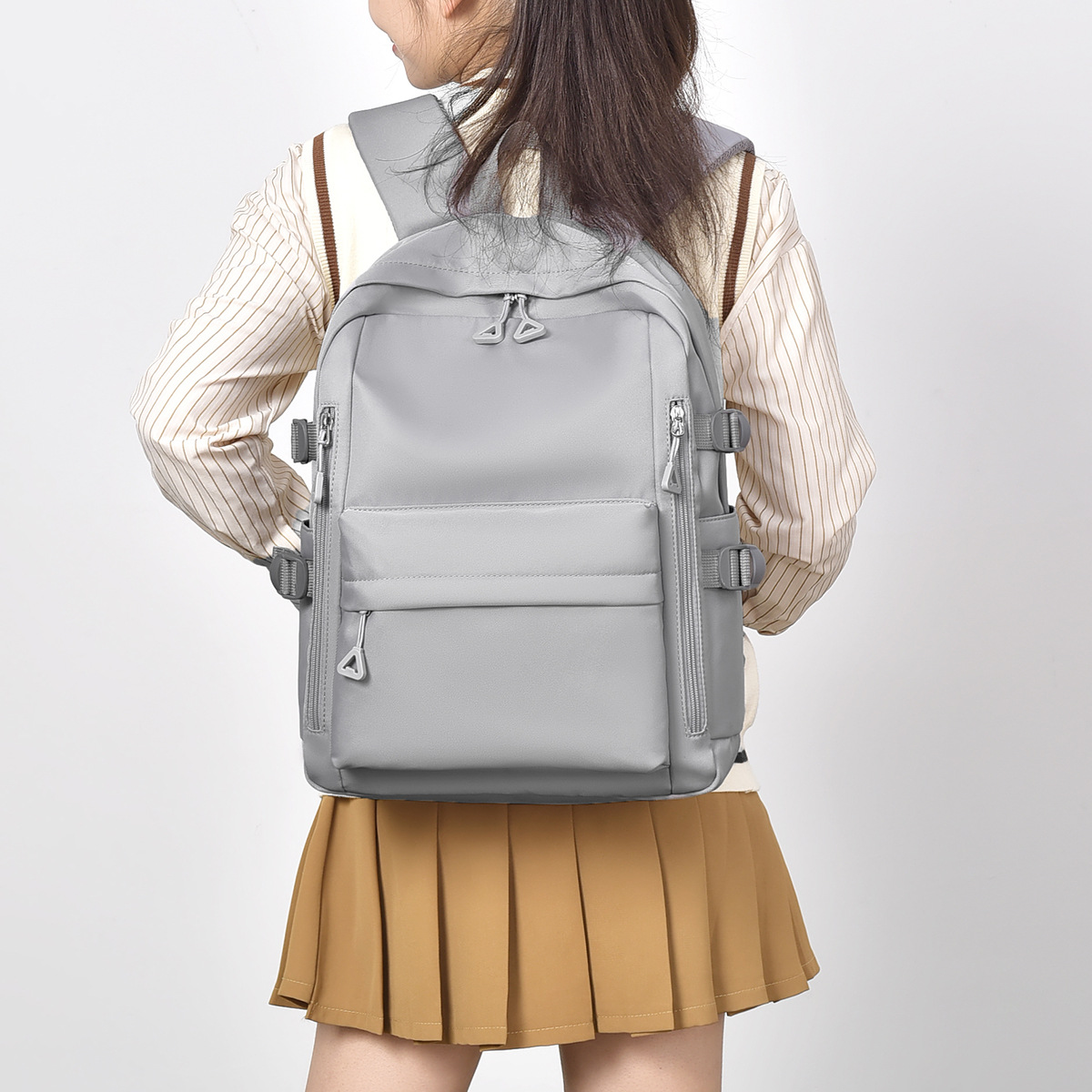 Mochila de moda de estilo simple, de gran capacidad, nueva mochila para hombres y mujeres de secundaria, textura ligera, mochila escolar para estudiantes