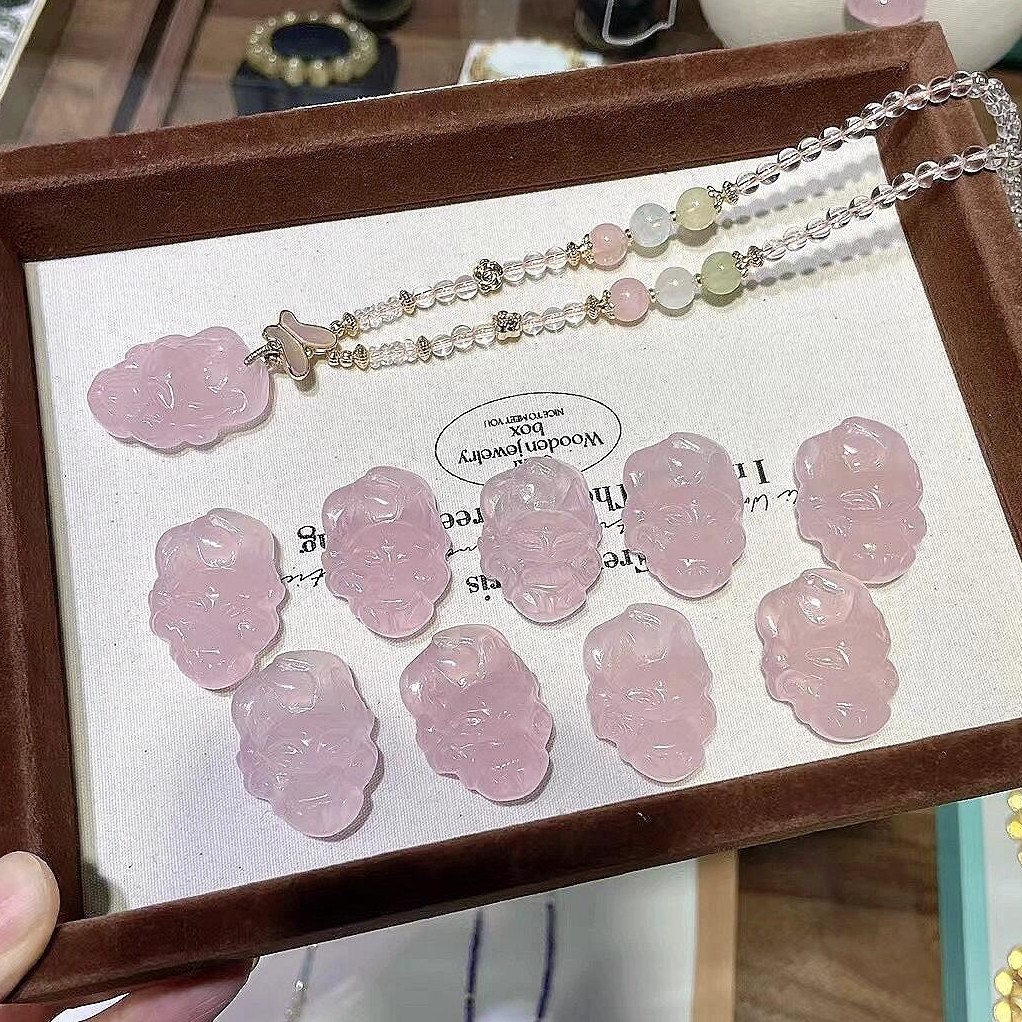 Crystal, carved pendant