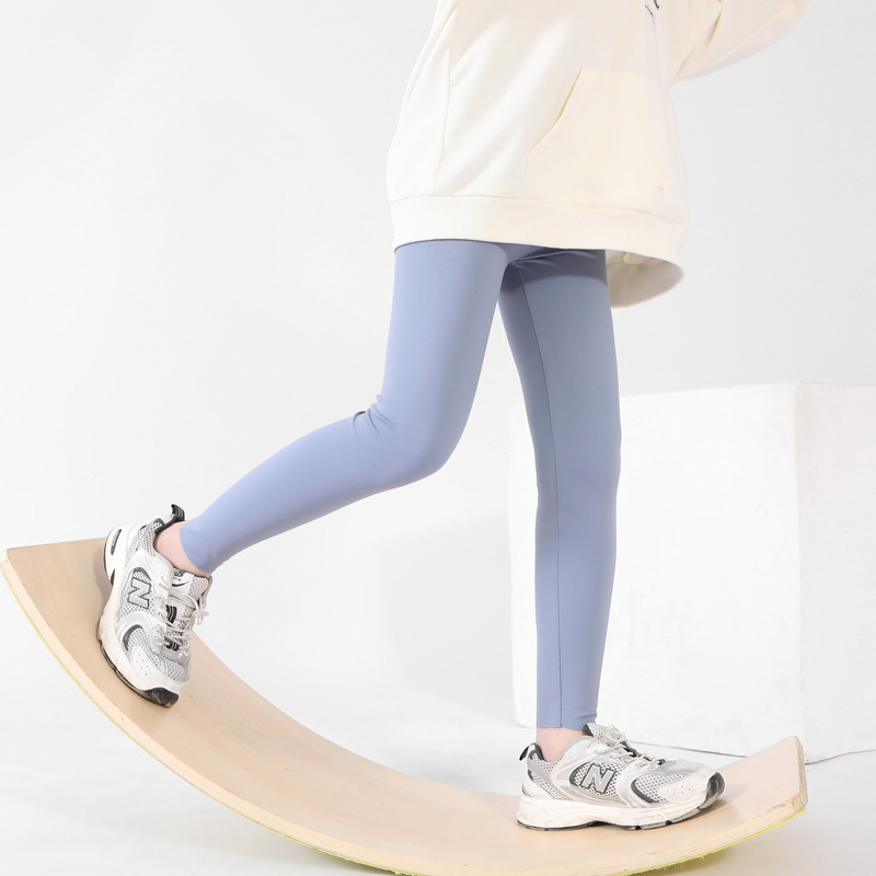 Pantalones de tiburón para niñas primavera y otoño ropa de bebé delgada Pantalones deportivos de corte casual niños medianos y grandes estiran pantalones de yoga fabricante