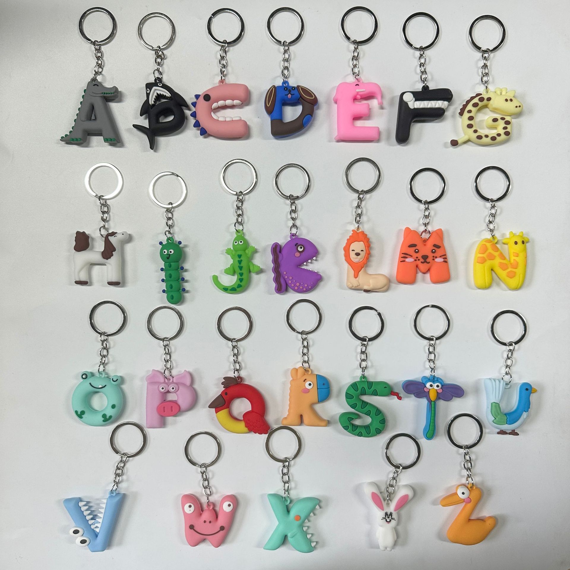 Caja ciega fuente llavero de dibujos animados colgante muñeca PVC estudiante mochila escolar linda pequeña llave de regalo pequeño colgante