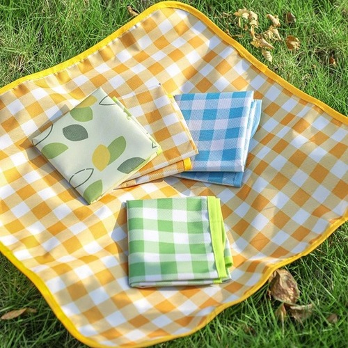 Foldable, waterproof, and moisture-resistant outdoor camping lawn mat—perfect for spring outings, portable picnic mats, and music festival grassy areas.