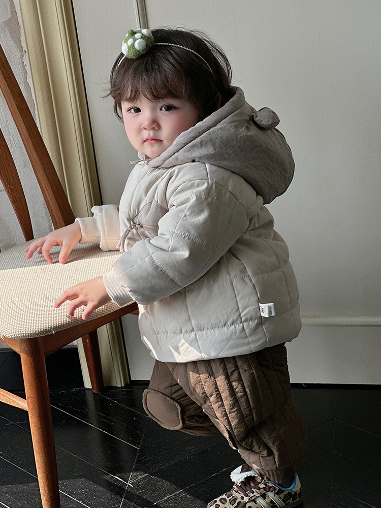 2024 nuevo bebé de invierno versión coreana estilo occidental bolsillo creativo cremallera engrosamiento cálido y cómodo traje de bebé suave