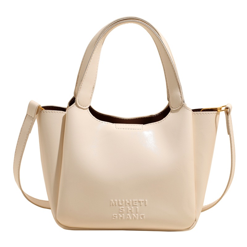 Vintage Maillard bolso de mano para mujeres 2025 nuevo estilo transfronterizo popular aceite cera cuero bolso de cubo textura mochila