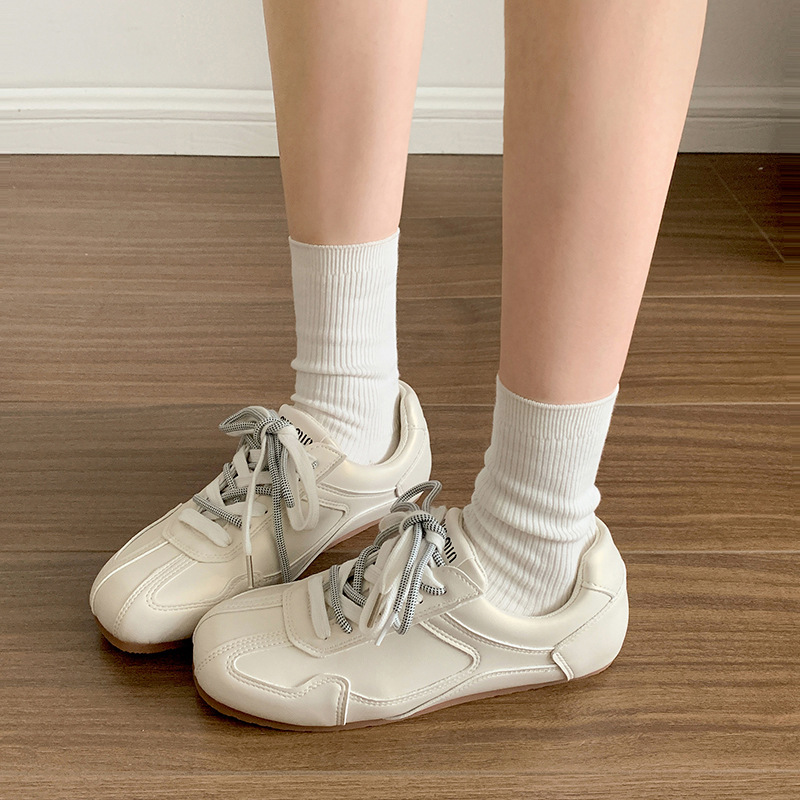 Zapatos blancos pequeños productos de caucho juventud plata 100 correa cruzada 2026 nueva mujer coreana de otoño negro