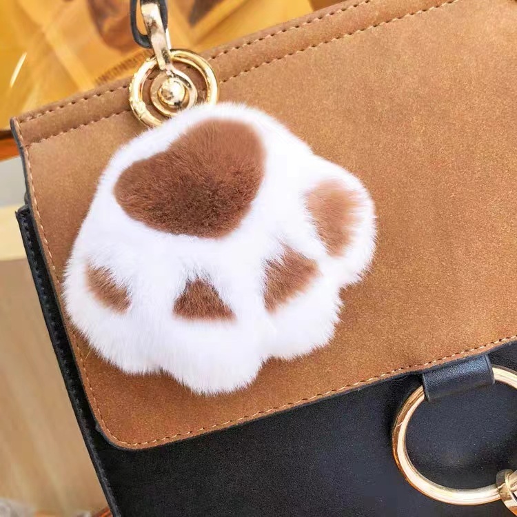 卸売りのミンク防止のぬいぐるみの猫の爪のキーホルダーはファッション的でかわいい猫の子犬の爪の印の包みのアクセサリーを掛けます。|undefined