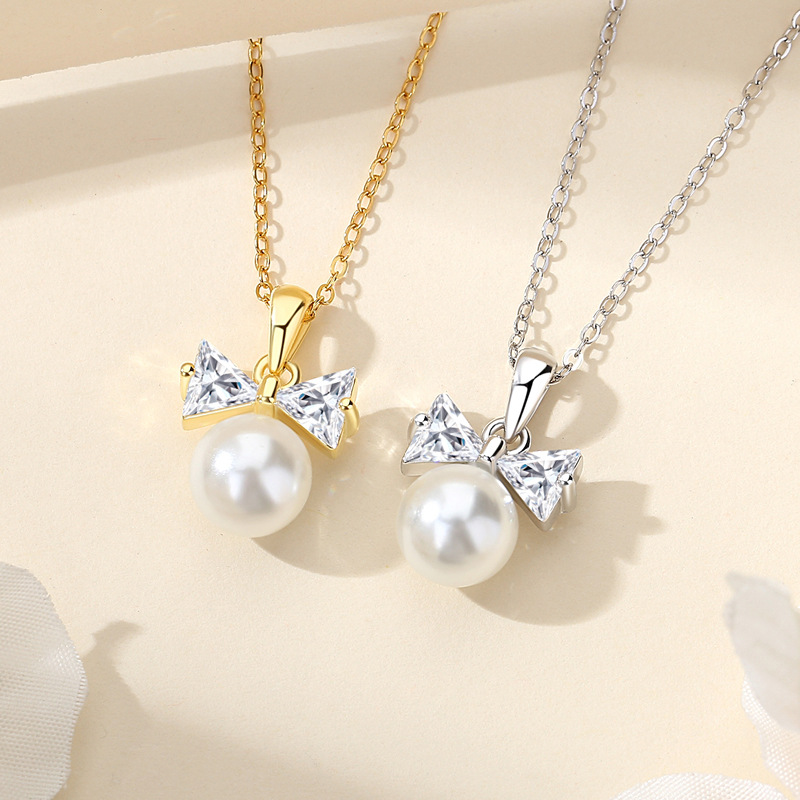 S925 collar de perlas de plata esterlina lazo collar de estilo de lujo ligero collar largo de alta gama lujo ligero nicho