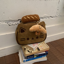 可爱猫咪斜挎包女2025新款卡通小方包高级感小众外出通勤单肩包