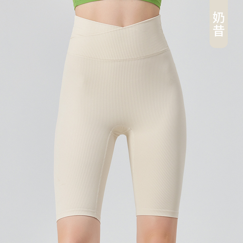 Cintura alta cruzada Levantamiento de cadera pantalones de cuatro cuartos entrenamiento transpirable para mujeres medias de contracción del vientre pantalones cortos deportivos de yoga pantalones de montar