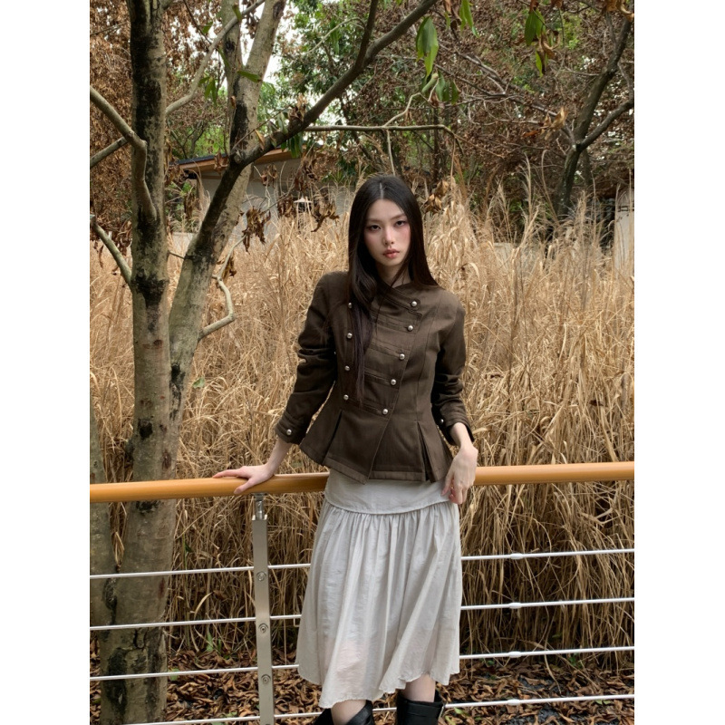 Autumn and winter retro military-style stand-up collar short jacket for women, featuring diagonal metal buttons, a fitted waist, and a skirt-like hem, exuding a chic and elegant vibe Autumn and winter retro military-style stand-up collar short jacket for women, featuring diagonal metal buttons, a fitted waist, and a skirt-like hem, exuding a chic and elegant vibe
