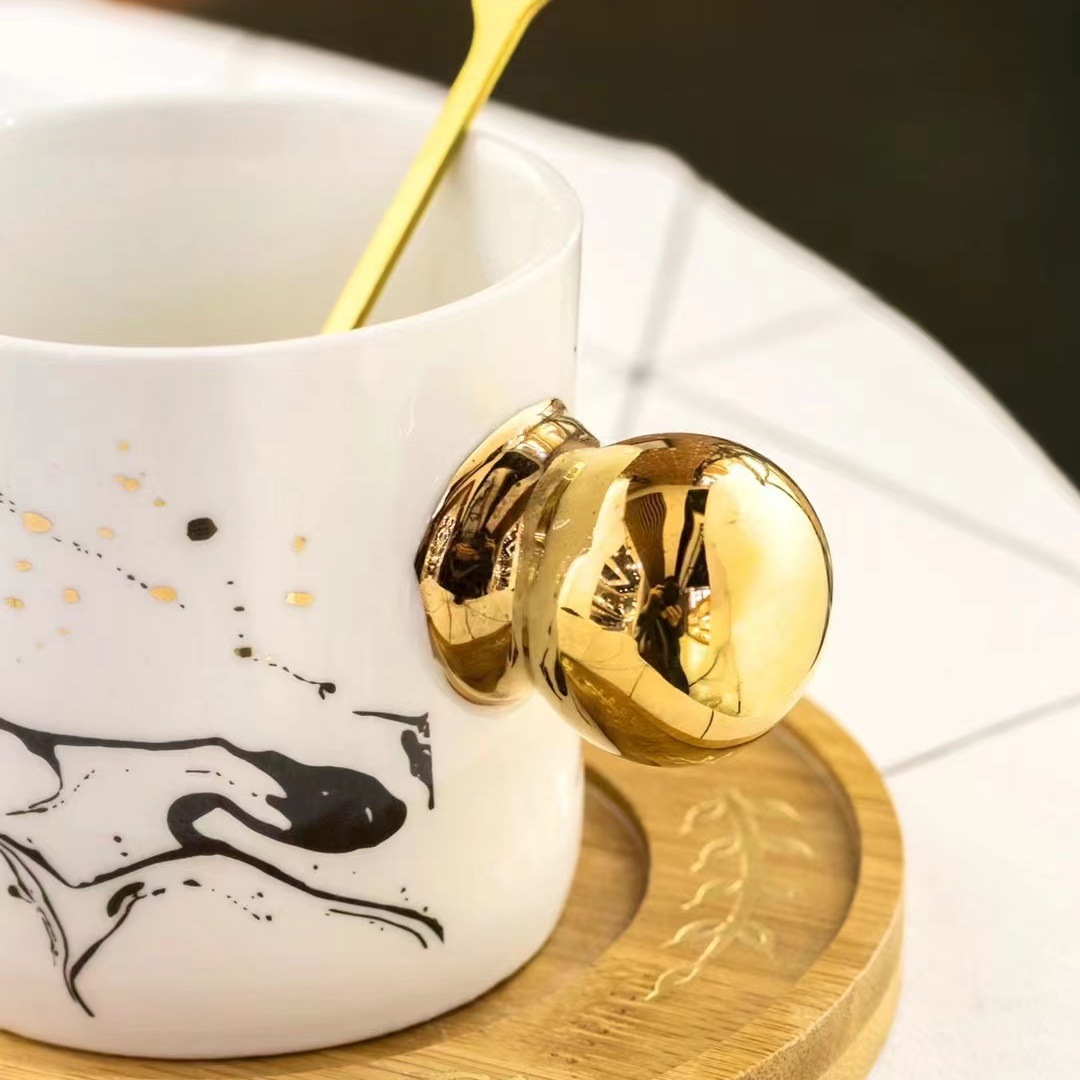 Personalidad creativa marbling regalo Taza de cerámica y platillo taza de oro mango de cerámica nórdica taza de té de la tarde