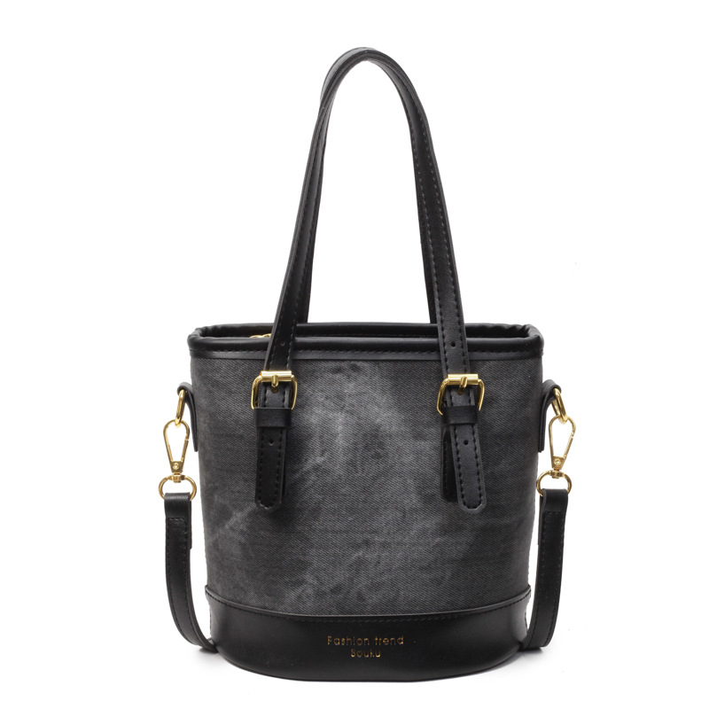 Bolso de mano de color de contraste de comercio exterior para mujer 2025 nuevo bolso de cubo de ocio salvaje simple bolso de mensajero de un solo hombro de alta gama