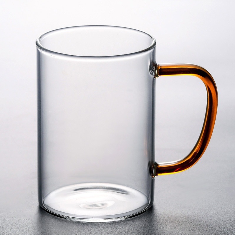 En stock taza de jugo para el hogar taza de leche de oficina taza de desayuno mango de color vidrio transparente taza de vidrio de una sola capa
