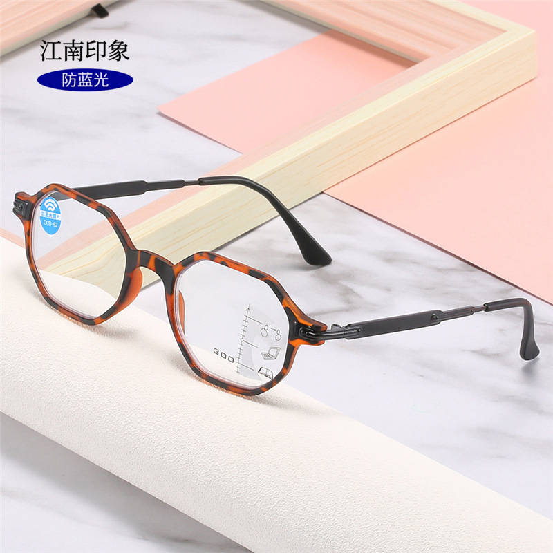 オーダーメードのファッションのレトロな多焦点の老眼鏡の男性の青い光の花の鏡の女性の高清の読書鏡の卸売りの老眼鏡