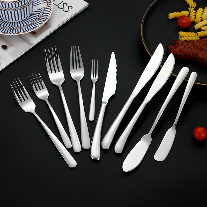 Cruzar la frontera 304 vajilla de acero inoxidable traje elegante serie Hotel Occidental cuchillo de carne, tenedor y cuchara gruesa cuchara de hogar