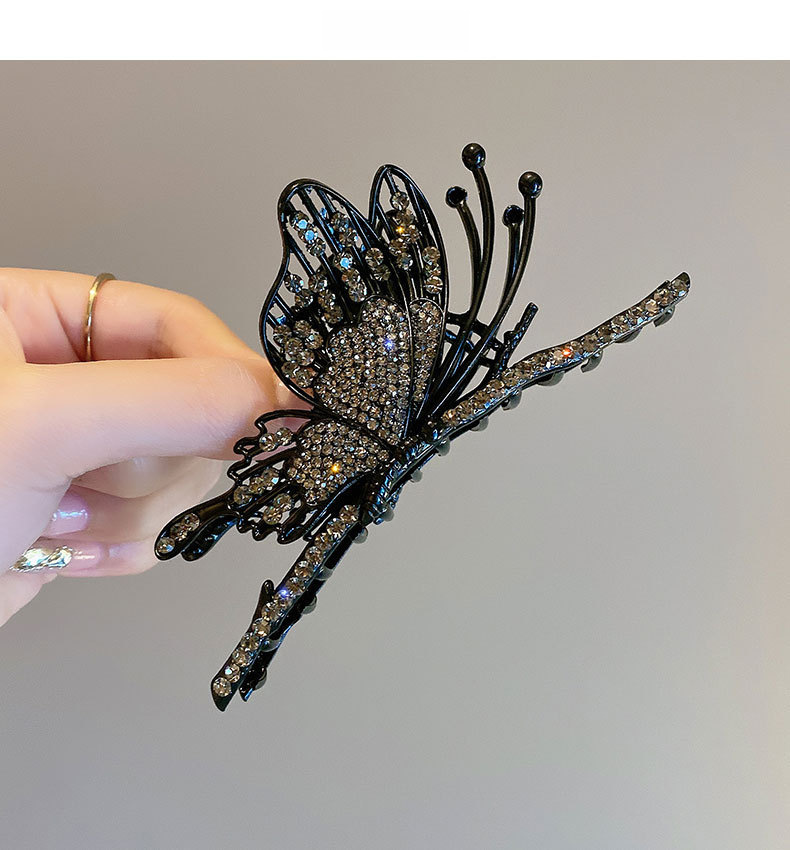 Fermaglio a farfalla nero con strass elegante accessorio capelli_voghion.com