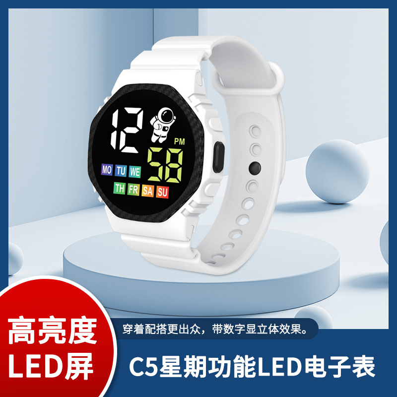 En stock nuevo C5-17 astronauta con semana ins Wind Net rojo de dibujos animados niños deportes LED reloj electrónico
