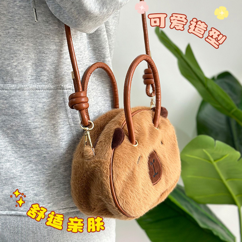 Bolsa de conchas de animales de peluche de red Kapibara muñeca del Dolphin de agua mochila de 8 pulgadas bolsa agarrada al por mayor en stock