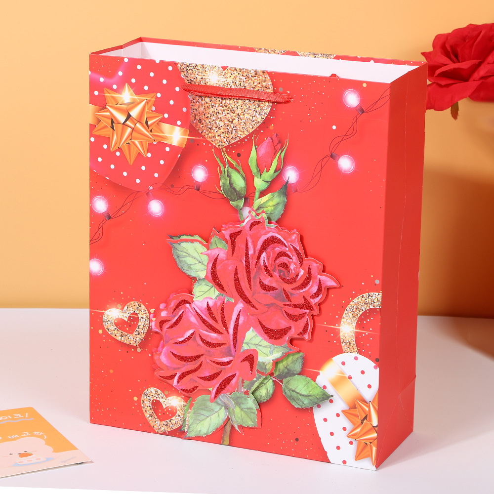 Bolsa de regalo cuadrada de papel rojo para Año Nuevo, diseño con rosas
