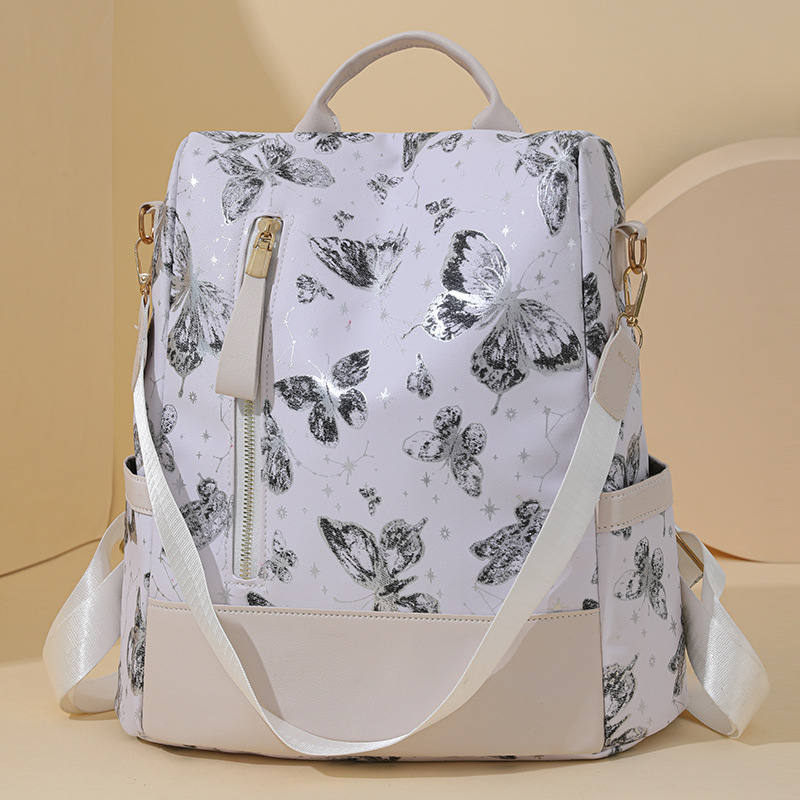 2024 nuevo estilo mariposa estampado antirrobo señoras mochila moda contraste color al aire libre viaje mochila de tres usos al por mayor marea
