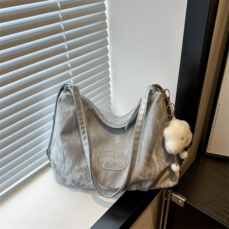 Bolsa de sensación relajada, bolsa de mujer, gran capacidad de verano, 2024, nueva bolsa de viaje de hombro de un solo tipo