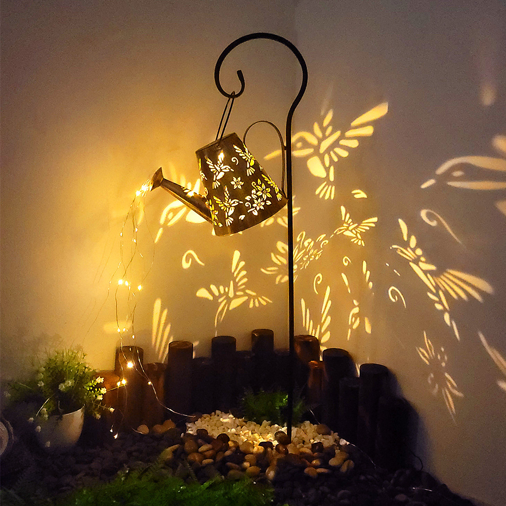 Transfronterizo nueva caldera de hierro lámpara de césped lámpara de jardín lámpara de paisaje agua Libélula lámpara de proyección de dibujos animados