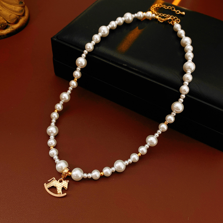 Oro verdadero eléctrico galvanis colgante de piedra pony pendientes collar ligero lujo nicho universal conjunto temperamento alta sensación de joyería mujer