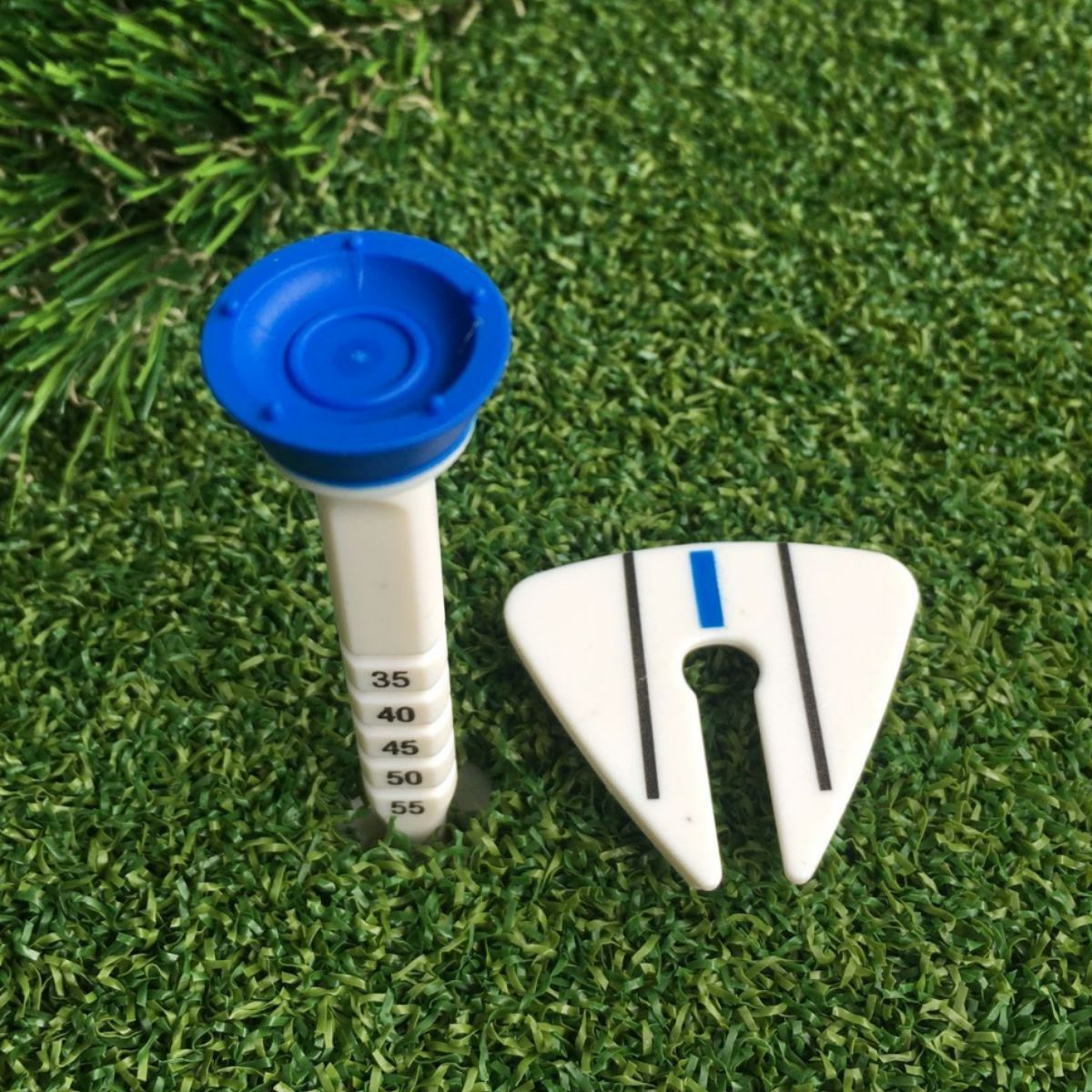 Golf nail tee altura ajustable dirección del objetivo Mark Ball asiento en caja ventilador suministros ventas directas de la fábrica