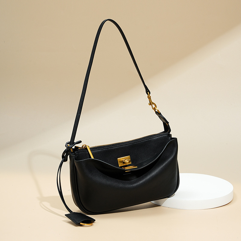 Niche-style genuine leather high-end crossbody bag for women, suitable for office commute and casual use, with a top-grade cowhide design.