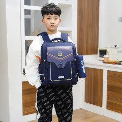 自然の魚のかばんの新型の英倫風の1から6年生の背もたれは男の子と女の子の子供の小学生のリュックサックを減らします。