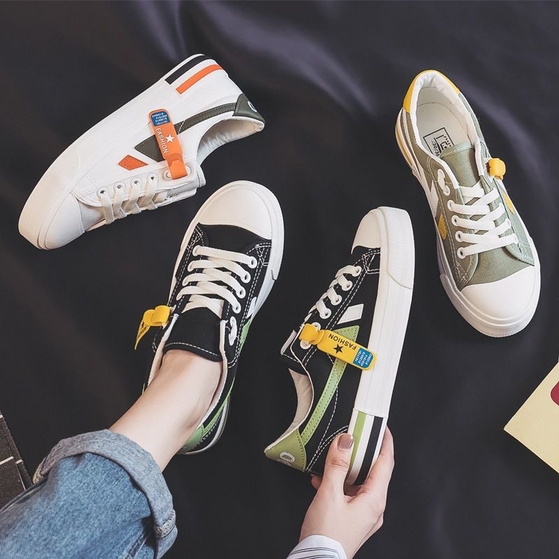 Zapatos blancos de primavera y otoño para mujeres zapatos de lona de altura baja primavera 2026 nuevos estudiantes coreanos zapatos de goma transfronterizos transfronterizos