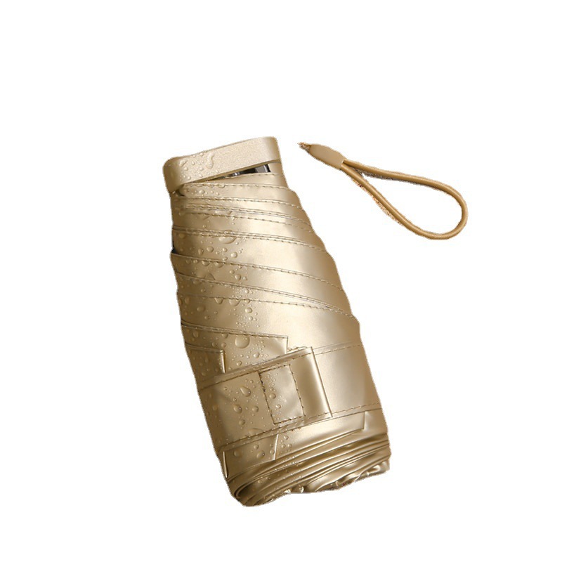 Seis veces mini paraguas de Sol de pegamento de oro nuevo creativo súper plano pequeño paraguas de oro pegamento de oro paraguas de protección solar paraguas de bolsillo