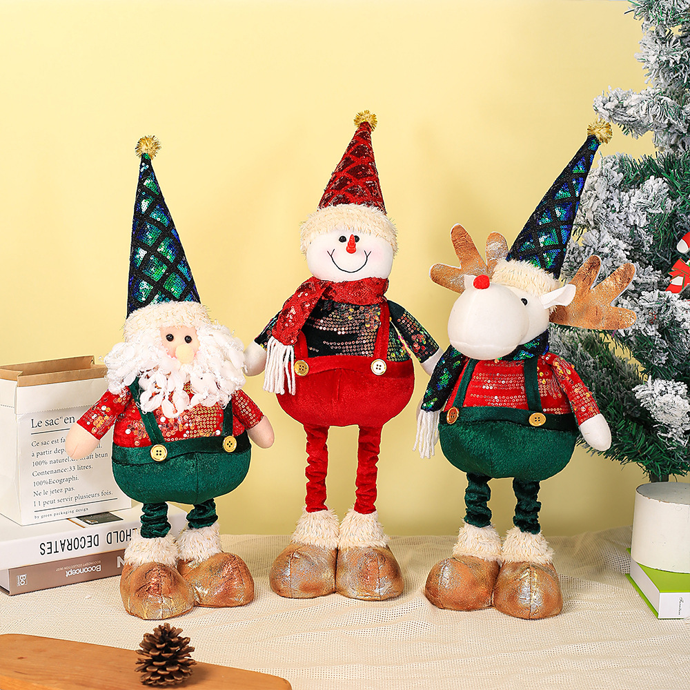 Cross-border Santa Claus muñeco de nieve alce adorno pierna retráctil muñeca ventana de Navidad decoración del hogar regalo