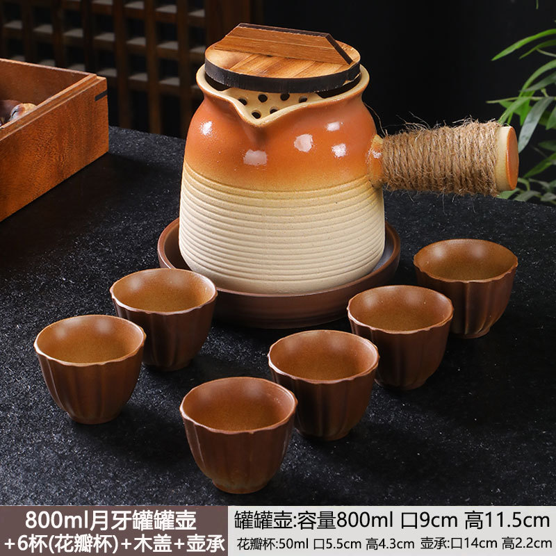 Tetera en una estufa, tarros de té con leche a la parrilla, ollas especiales, utensilios de cerámica de cocción en seco para el hogar, juego completo de juegos de té