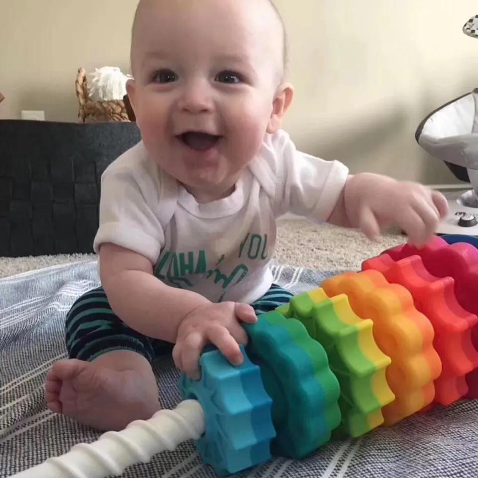 Del bebé cognoscitivo Arco Iris girando torreta de los niños jengle educación temprana geométrica giratoria virola girando juguete