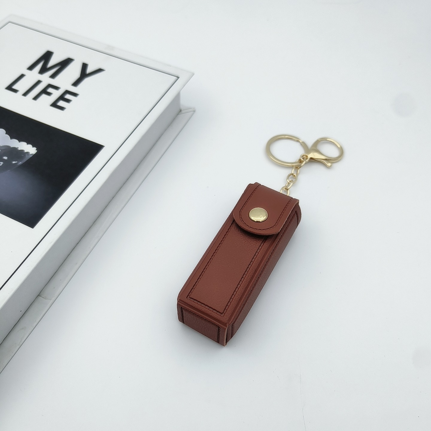 Bolso de cambio transfronterizo sobre rojo espejo creativo llavero colgante pequeño PU cuero bolso de coche accesorios accesorios en stock