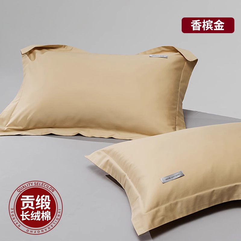 Un par de fundas de almohada de algodón de algodón de fibra larga de satén