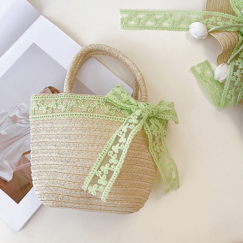 Nicho popular estilo coreano tulipán arco de papilla para niñas sombrero de paja paquete de bolsas pequeñas frescas dulces gorras de protección solar