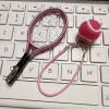 Pink tennis racket + pink ball