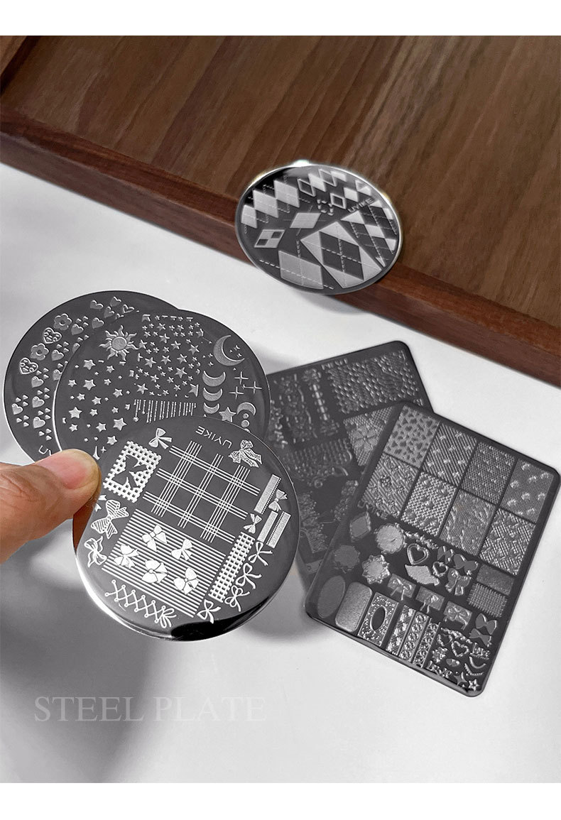 New 12-piece nail art steel plate set with leopard print, plaid, lace, and bow print transfer templates and tools wholesale