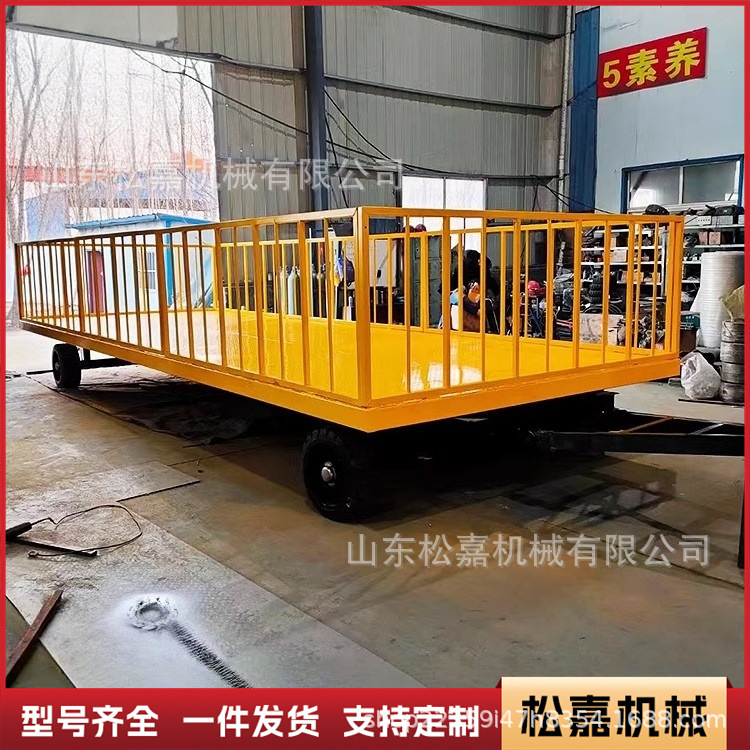 Carretilla elevadora remolque de plataforma plana camión de transferencia de carga de fábrica pesada camión de rotación de taller de dirección de cuatro ruedas de gran tonelaje