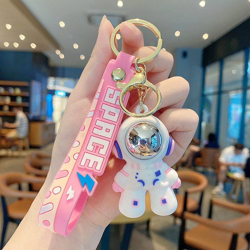 Dibujos animados cosmonauta astronauta astronauta muñeca llavero accesorios de automóvil creativos lindo bolso de pareja colgante regalo