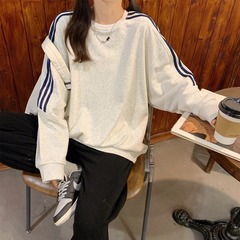 早秋の新型ストライプのデザイン感三条の丸首のパーカーの女性のゆったりとしたカジュアルな香港風の小さい長袖の上着