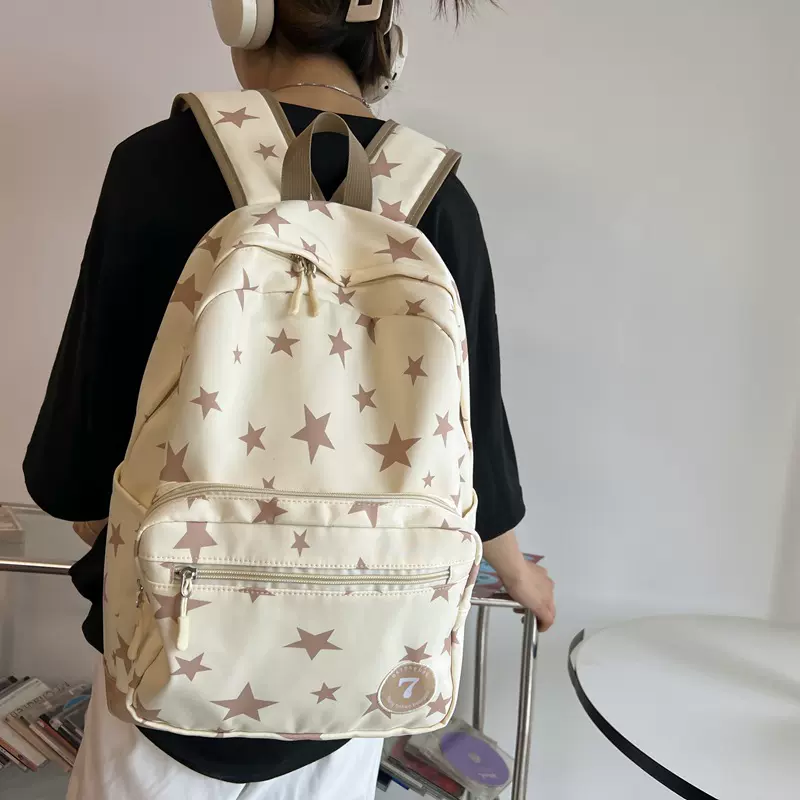 书包初中生女ins森系大容量外出旅行背包新款潮流星星印花双肩包