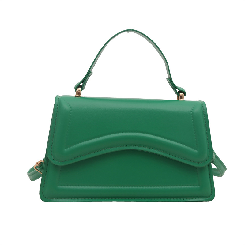 Texturas de moda en estilo de estilo de viaje ocio personalidad de primavera 2025 nuevo bolso de mano minimalista nicho bolso de mochila