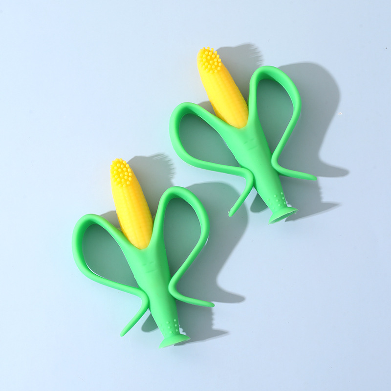 Inglés embalaje independiente bebé completo de silicona maíz mordedor cepillo de dientes en forma de flor mordida pegamento dientes titular bebé mordedor