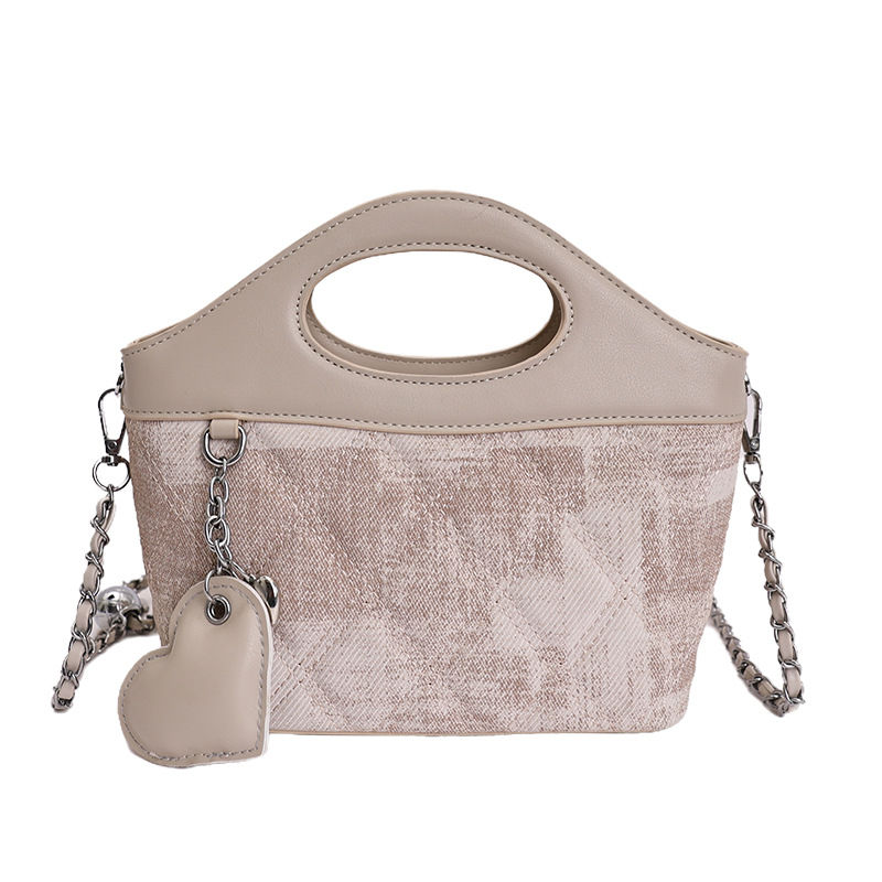 Bolsa de cadena de diamante diaria bolsa de cuero suave de mujer 2026 nuevo verano relajado bolsa de hombro inclinada para viajar