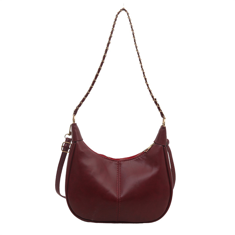 Bolsa de cadena de textura para mujeres de gran capacidad 2025, nuevo bolso de mujer simple PU, bolso de hombro de moda empalmado mochila