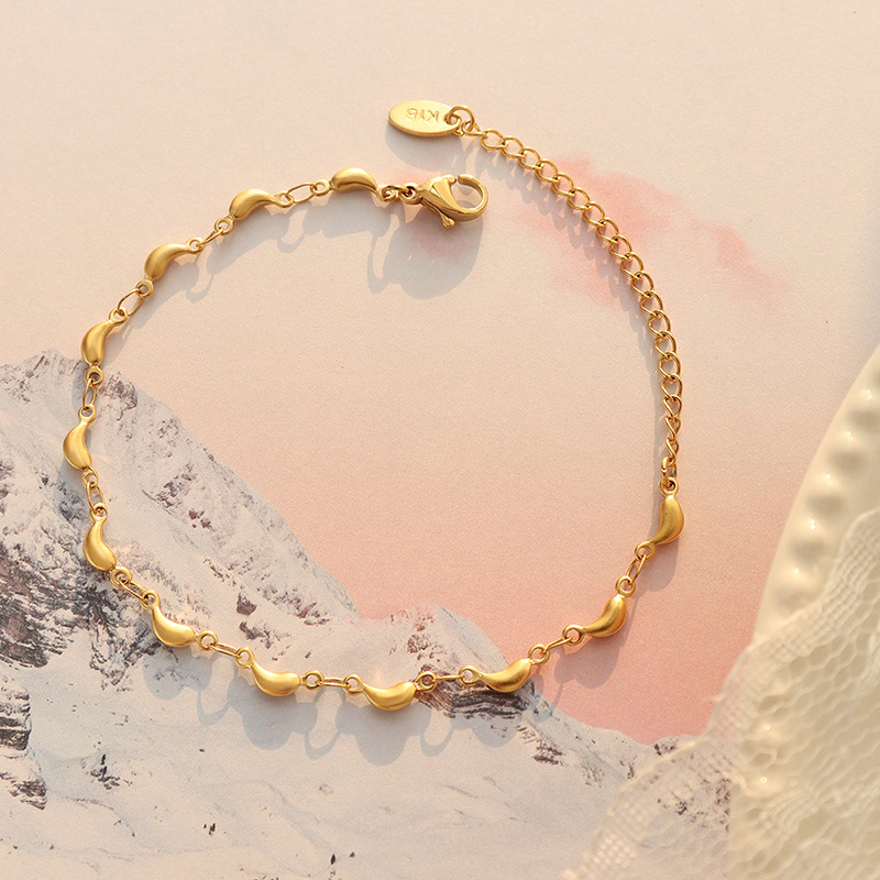 Conjunto de joyería transfronteriza chapada en oro, pequeño animal fresco y dulce europeo y americano, colgante de delfín, collar, material de acero de titanio