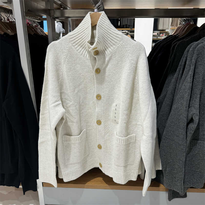 新しい秋冬の男性の婦人服のニットのカーディガンの舒芙蕾のセーターのカジュアルな百合のゆったりした純色のコートのM469467|undefined